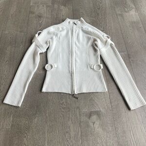 Women’s strappy zip up long sleeve sweater